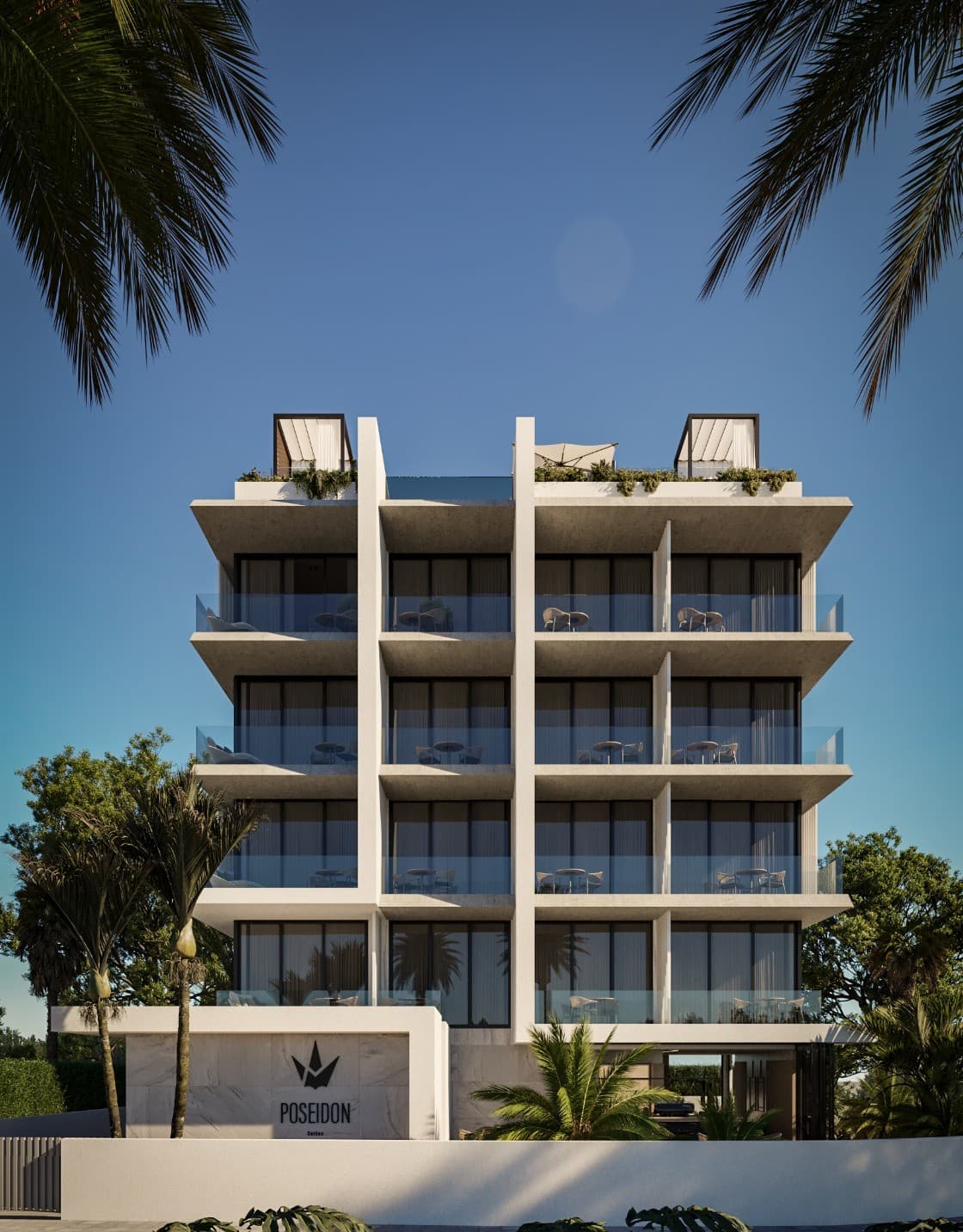 Poseidon building exterior with palm trees and clear blue sky